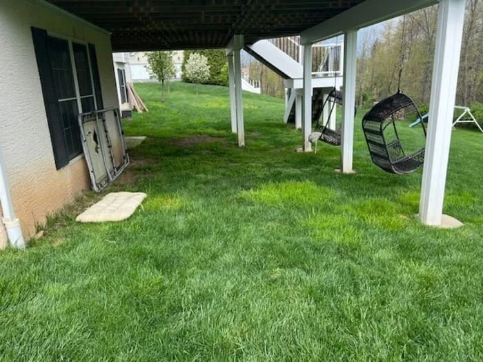 Residential hardscape creation with under deck and subsurface drainage renovation, landscape creation and low voltage lighting addition project in Jamison, PA